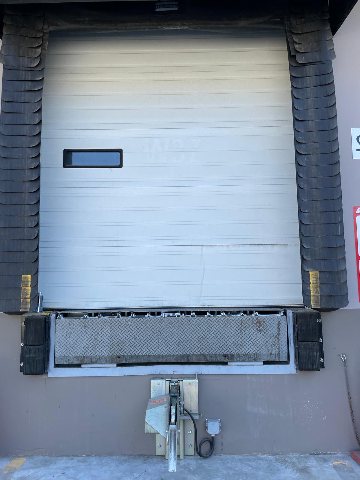 Dock door with a small window